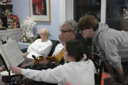 Mallory and Kevin play Christmas music